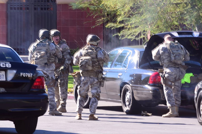 A swat team arrives at the scene of a shooting in San Bernardino, Calif. on Wednesday, Dec. 2, 2015 (AP Photo)