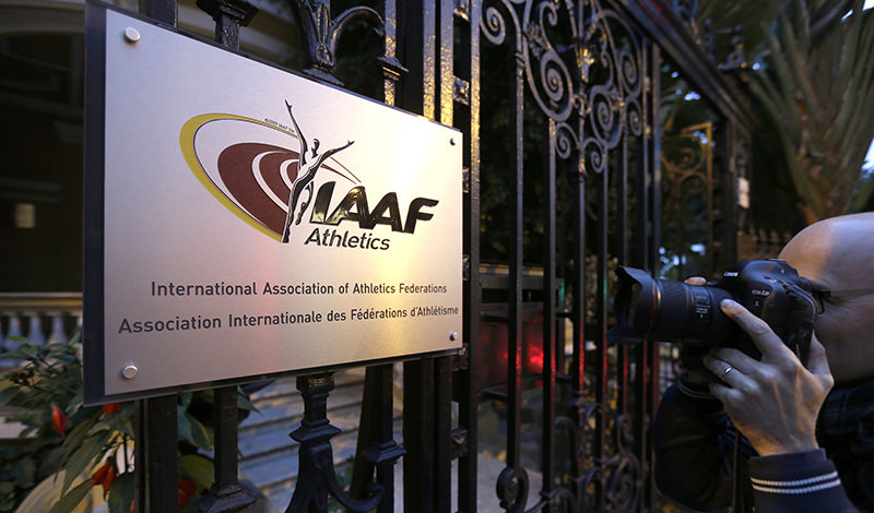In this Nov.13, 2015 file photo, a photographer pictures the logo at the IAAF (International Amateur Athletic Federation) headquarters in Monaco (AP Photo)