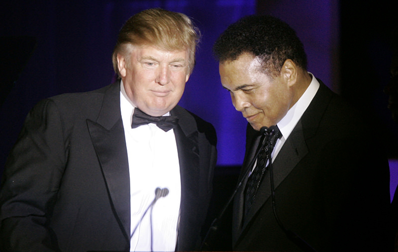 n this March 24, 2007, file photo, Donald Trump, left, accepts his Muhammad Ali award from Ali at Muhammad Ali's Celebrity Fight Night XIII in Phoenix, Ariz (AP Photo)