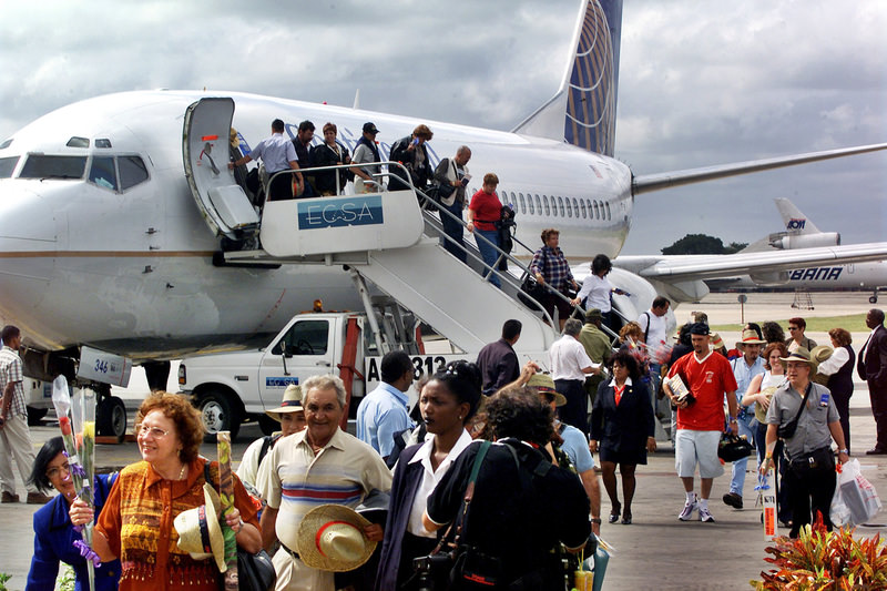 In this Nov. 1, 2001, file photo, the first passengers of the first flight of Continental Airlines from Florida, arrives at the Jose Marti Airport of Havana, Cuba. (AP Photo)