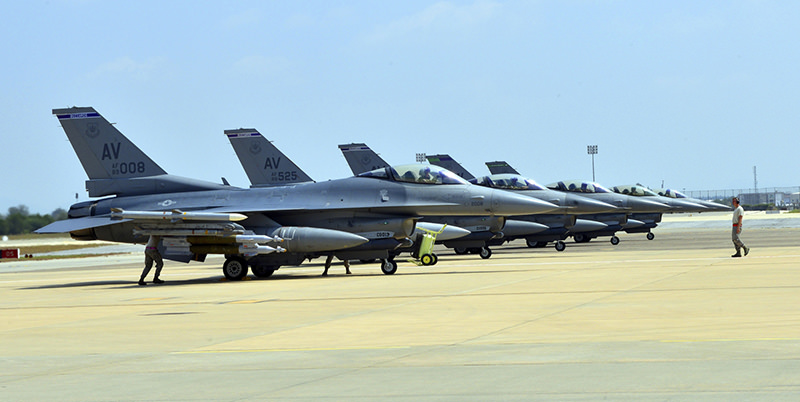 Six U.S. Air Force F-16 Fighting Falcons from Aviano Air Base, Italy, are seen at Incirlik Air Base, Turkey, after being deployed, in this U.S. Air Force handout picture taken August 9, 2015.(Reuters Photo)