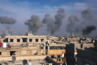 Smoke billows after airstrikes by regime forces on the town of Douma in the eastern Ghouta region, a moderate stronghold east of the capital Damascus, Syria.