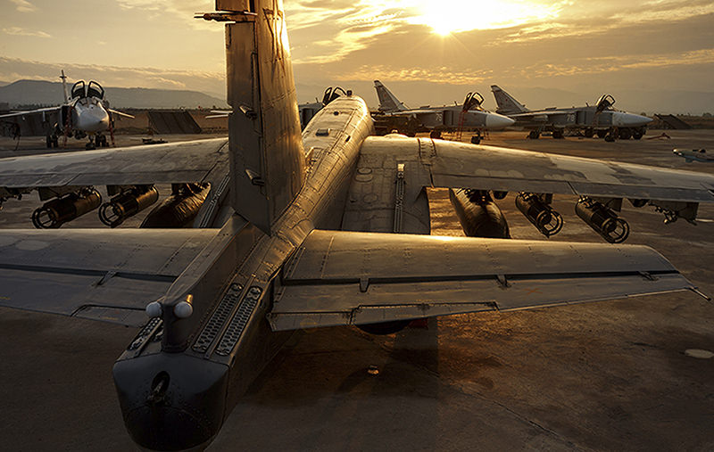 This handout photo taken on Friday, Dec. 18, 2015 provided by the Russian Defense Press Service, shows a Russian Su-25 ground attack jet is parked at the Hemeimeem air base in Syria (AP Photo)