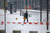 Police removes suspicious yellow postal crates near the chancellory in Berlin, Germany on January 6, 2016. (Reuters)