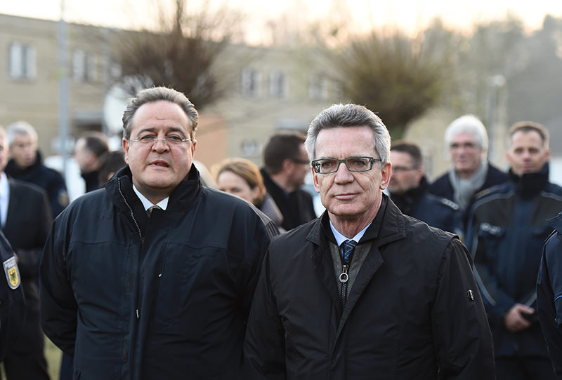 German Interior Minister Thomas de Maiziere (R) and The President of the German Federal Police Bundespolizei, Dieter Romann in Berlin on Dec 16, 2015 (AFP)