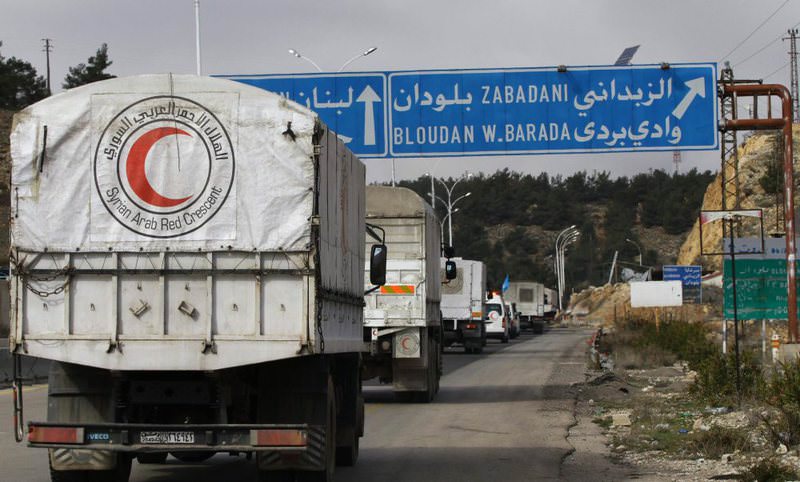 A convoy of aid from the Syrian Arab Red Crescent on the way to the besieged rebel-held Syrian town of Madaya on Jan. 14.