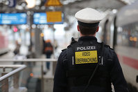 An officer of the German federal police patrols the main railway station equipped with a body video camera in Cologne, Germany, 01 February 2016 (EPA Photo)