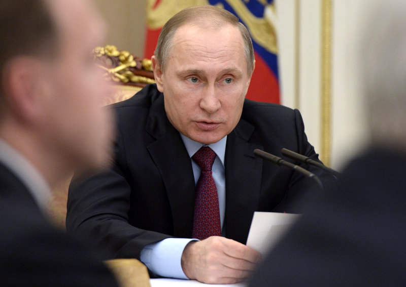 Russian President Vladimir Putin holds a meeting on privatization issues at the Kremlin in Moscow.
