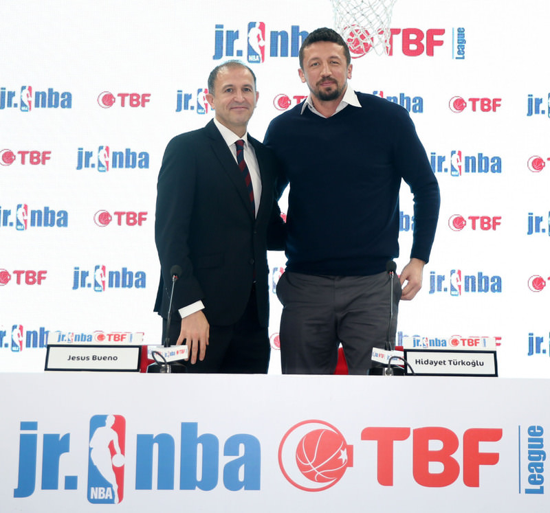 TBF CEO and former NBA star Hidayet Tu00fcrkou011flu (L) and NBA EMEA Vice President of Business Development Jesus Bueno poses together after they announced a new partnership to create the Jr. NBA TBF Basketball League.