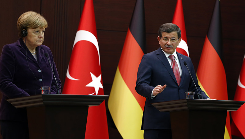 Prime Minister Ahmet Davutou011flu with German Chancellor Angela Merkel in Ankara, Turkey (AA Photo)