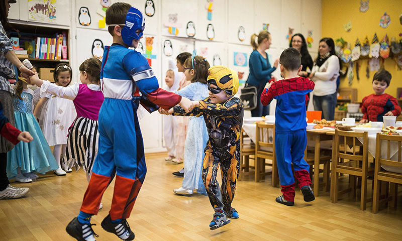 Children dressed in fancy costumes dance during the carnival celebrations in the Children's House Kindergarten in Nyiregyhaza, Hungary (EPA Photo)
