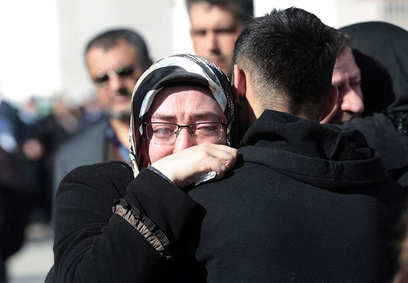 Family members of victims comfort each other outside the medical forensics site in Ankara, Turkey , Feb. 18, 2016 (AP)