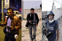 Anadolu Agency correspondent Rauf Maltau015f (L), photojournalist Onur u00c7oban (C) and cameraman Kenan Yeu015filyurt (R)