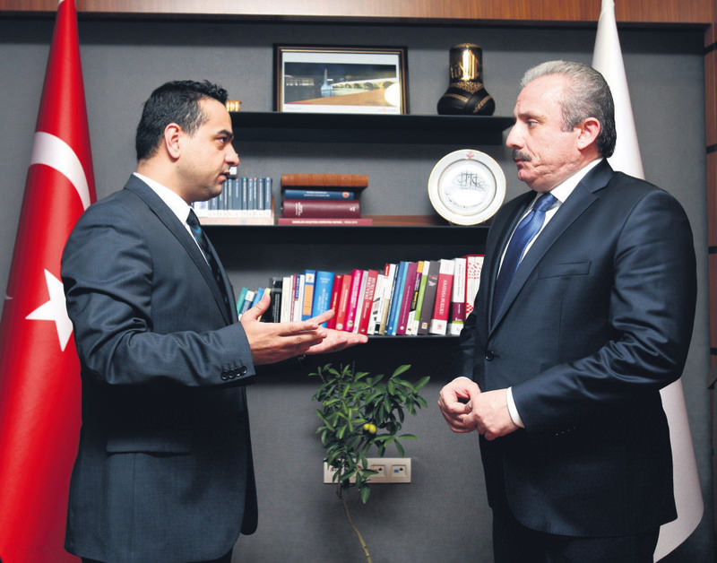 The chairman of the Parliament's Constitution Committee, Mustafa u015eentop (R), spoke to Daily Sabah's Ankara correspondent Ali u00dcnal (L)