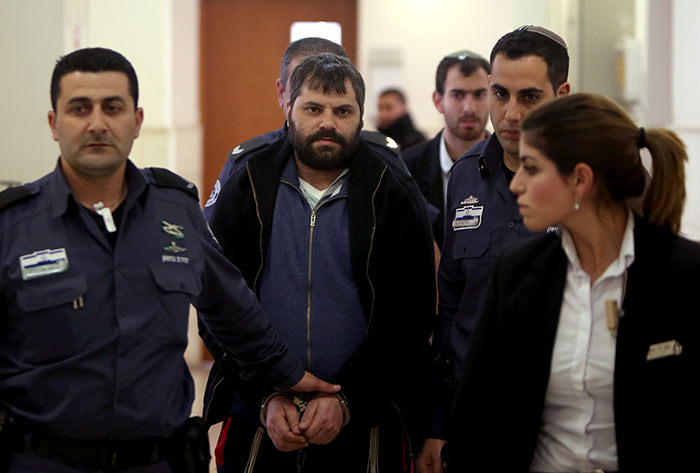Yosef Haim Ben-David (2L) who is the prime suspect charged with the abduction and murder of the Palestinian teenager Mohammed Abu Khdeir. February 11, 2016 (AFP Photo)