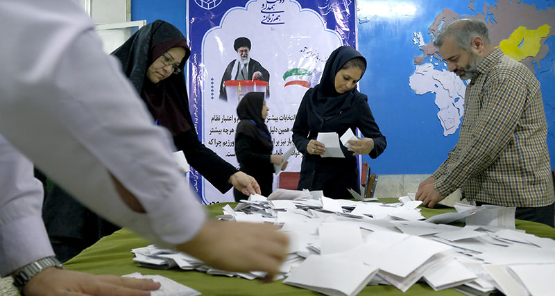 Election officials count ballot papers after the close of polling stations during elections for the parliament and a leadership body called the Assembly of Experts (Reuters Photo)