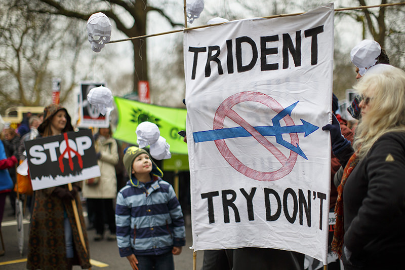 rotesters gather during an anti Trident rally, in Trafalgar Square, London, Saturday Feb. 27, 2016. (AA Photo)
