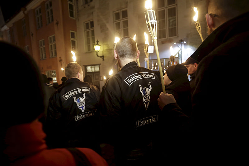 Members of Soldiers of Odin Estonia attend torch-lit procession during Independence Day celebrations in Tallinn, Estonia, in this Feb 24, 2016 photo (Reuters)