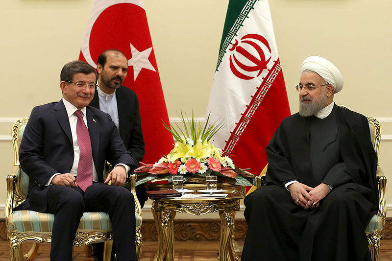 Iranian President Hassan Rouhani (R) meets Turkish Prime Minister Ahmet Davutoglu in Tehran, Iran March 5, 2016 (Reuters Photo)