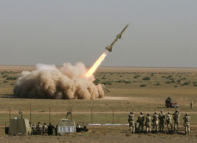 An Iranian Tondar missile is launched during a test at an unknown location in central Iran September 27, 2009 (Reuters)