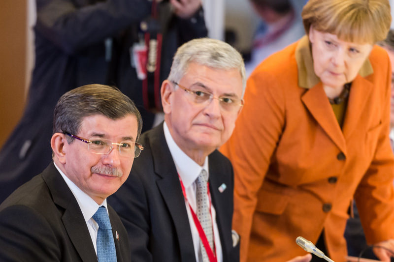 PM Davutou011flu (L) with German Chancellor Merkel (R) during a special Turkish-EU summit in Brussels on Monday.