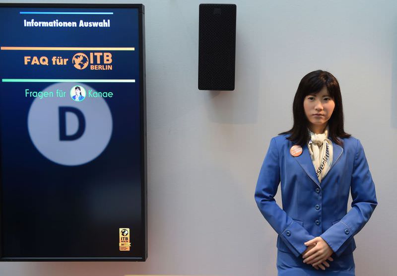 Robot Chihira Kanae, developed by Toshiba, is pictured at a welcome desk at the International Tourism Fair ITB in Berlin. 