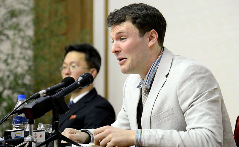  This file photo taken on February 29, 2016 shows US student Otto Frederick Warmbier (R), who is arrested for committing hostile acts against North Korea, speaking at a press conference in Pyongyang (AFP Photo)