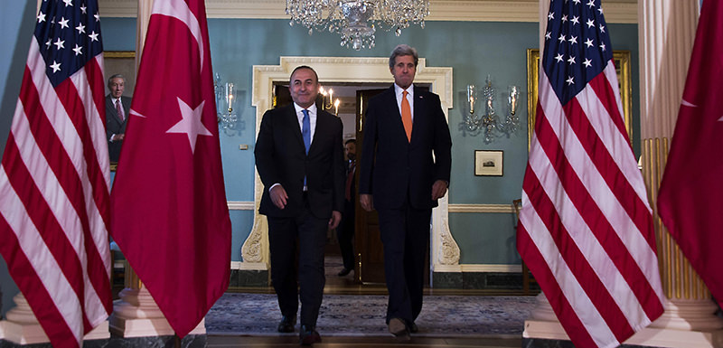 US Secretary of State John Kerry and Turkish Foreign Minister Mevlut Cavusoglu arrive a press availability at the State Department in Washington, DC March 28, 2016 (AFP Photo)