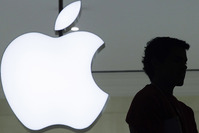  In a Wednesday, Dec. 7, 2011, file photo, a person stands near the Apple logo at the company's store in Grand Central Terminal, in New York. (AP Photo)