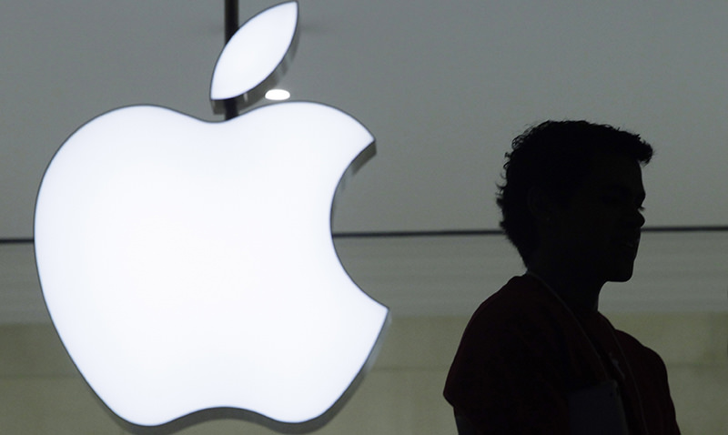  In a Wednesday, Dec. 7, 2011, file photo, a person stands near the Apple logo at the company's store in Grand Central Terminal, in New York. (AP Photo)