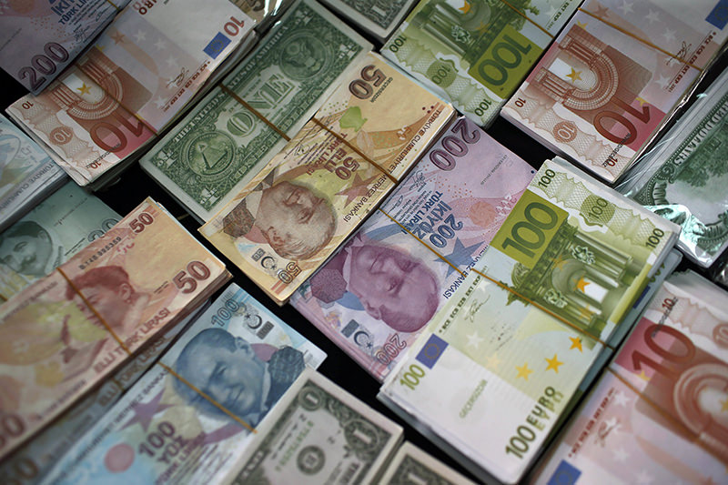 The dollar has been falling against other currencies, which gives a boost to traditional funds that donu2019t u201chedgeu201d against currency values. (AP Photo)