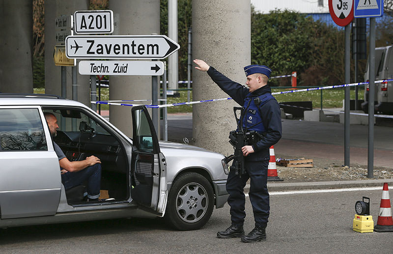 A Belgian police officer controls the access to Belgian international airport of Zaventem airport, Belgium, April 1, 2016. (Reuters)
