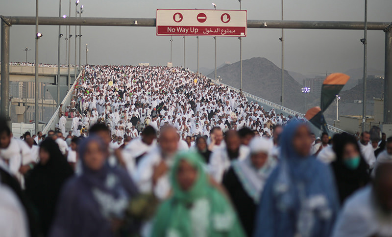 Hundreds of thousands of Muslim pilgrims make their way to cast stones at a pillar symbolizing the stoning of Satan, in a ritual called ,Jamarat,, the last rite of the annual hajj (AP Photo)