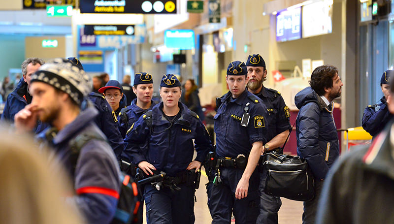 Swedish police patrol in Arlanda airport outside Stockholm, Sweden, Tuesday, March 22, 2016 (AP Photo)