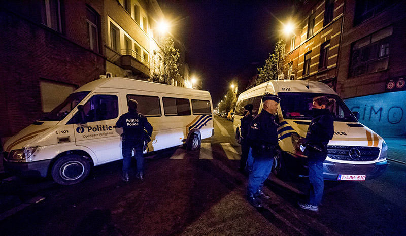 Belgian police are seen during a search in Anderlecht district in Brussels after 3 men were arrested this afternoon, in Brussels, Belgium, 08 April 2016
