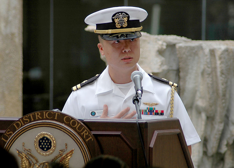 In this December 3, 2008 US Navy handout photo, shows Lt. Edward Lin, a native of Taiwan, shares his personal stories about his journey to American citizenship. (AFP Photo)