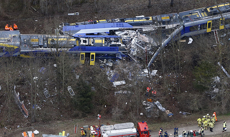 This Tuesday, Feb. 9, 2016 file photo shows an aerial view of rescue teams at the site where two trains collided head-on near Bad Aibling, Germany (AP Photo)