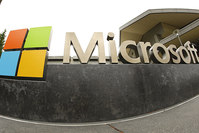 This July 3, 2014, file photo, shows the Microsoft Corp. logo outside the Microsoft Visitor Center in Redmond, Wash. (AP Photo)