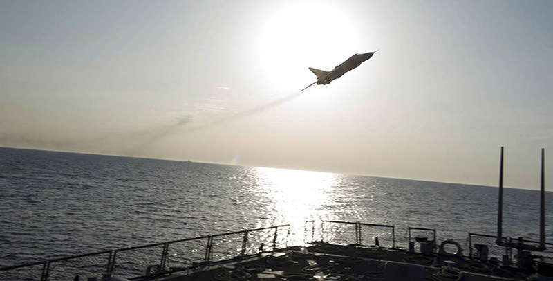 An U.S. Navy picture shows what appears to be a Russian Sukhoi SU-24 attack aircraft flying over the U.S. guided missile destroyer USS Donald Cook in the Baltic Sea in this picture taken April 12, 2016  (Reuters Photo)