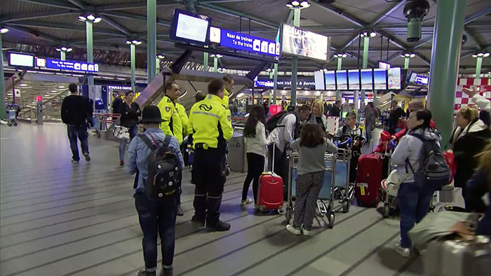 This image made from a video from RTL shows passengers waiting at Schiphol Airport in Amsterdam, Tuesday, April 12, 2016 (AP Photo)