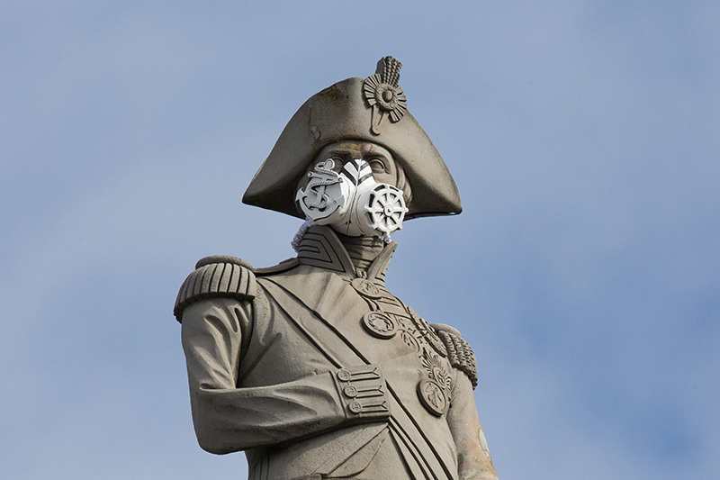 A nautical themed breathing mask is fixed to Lord Nelson's statue at the top of Nelson's Column in Trafalgar Square, central London on 18 April 2016. (AFP Photo)