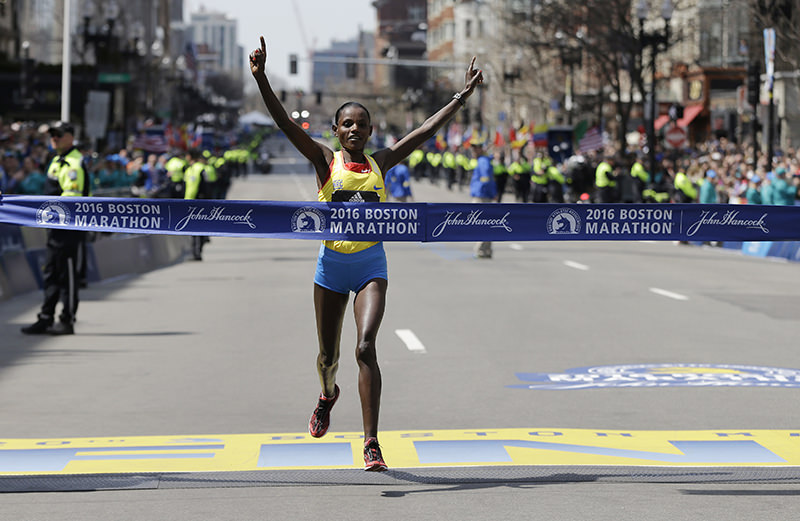 Atsede Baysa, of Ethiopia, crosses the finish line to win the women's division of the 120th Boston Marathon on Monday, April 18, 2016. (AP Photo)