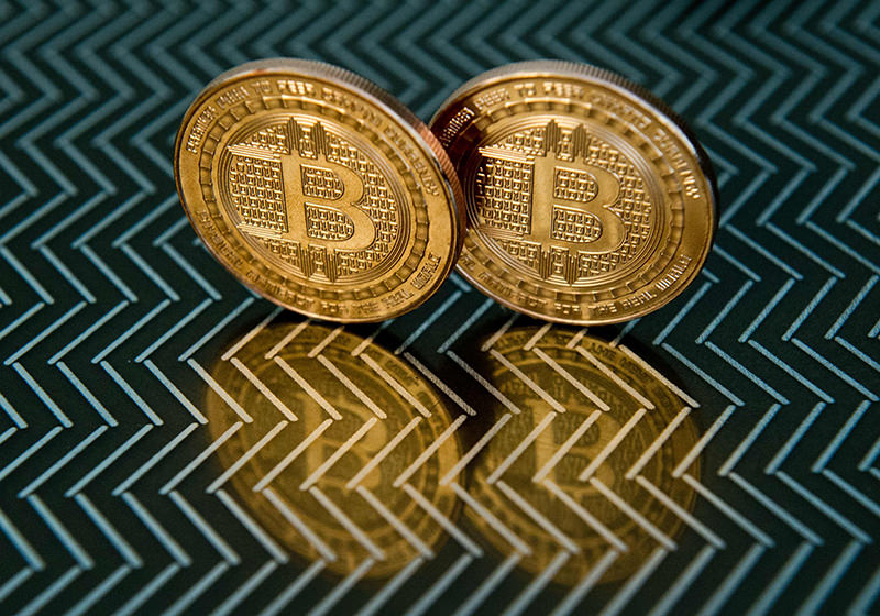 This file photo taken on June 17, 2014 shows bitcoin medals in Washington. (AFP Photo)
