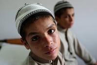 Two siblings Abdul Rasheed (L) and Shoaib Ahmed (R), who collapse into a vegetative state at night, are seen at hospital in Islamabad, Pakistan on May 6, 2016. (AA Photo)