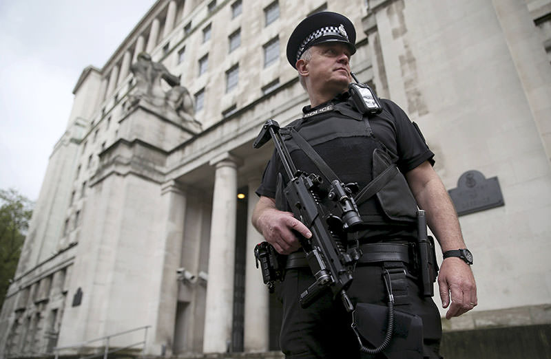 An armed police officer patrols near the Ministry of Defence in London, Britain May 11, 2016. (Reuters)