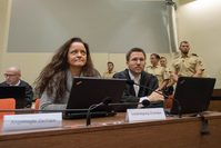 Beate Zschaepe (L) seated during the NSU trial in Munich on May 10. Zschaepe is accused of being a member of the neo-Nazi gang implicated in 10 murders between 2000 and 2007. (EPA Photo)