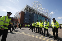 General view of police outside the stadium after the match was abandoned. (REUTERS Photo)