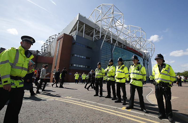 General view of police outside the stadium after the match was abandoned. (REUTERS Photo)