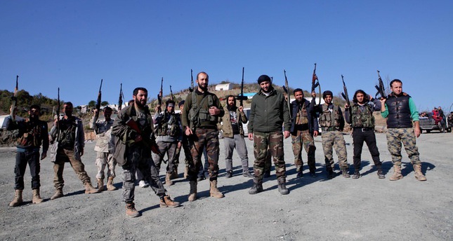 مجموعة من مسلحي المعارضة بجبل التركمان بريف اللاذقية شمال سوريا  صباح
