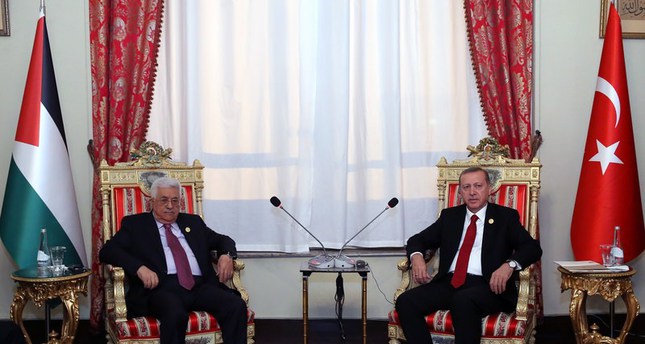لقاء مغلق جمع أردوغان وعباس على هامش قمة التعاون الإسلامي
